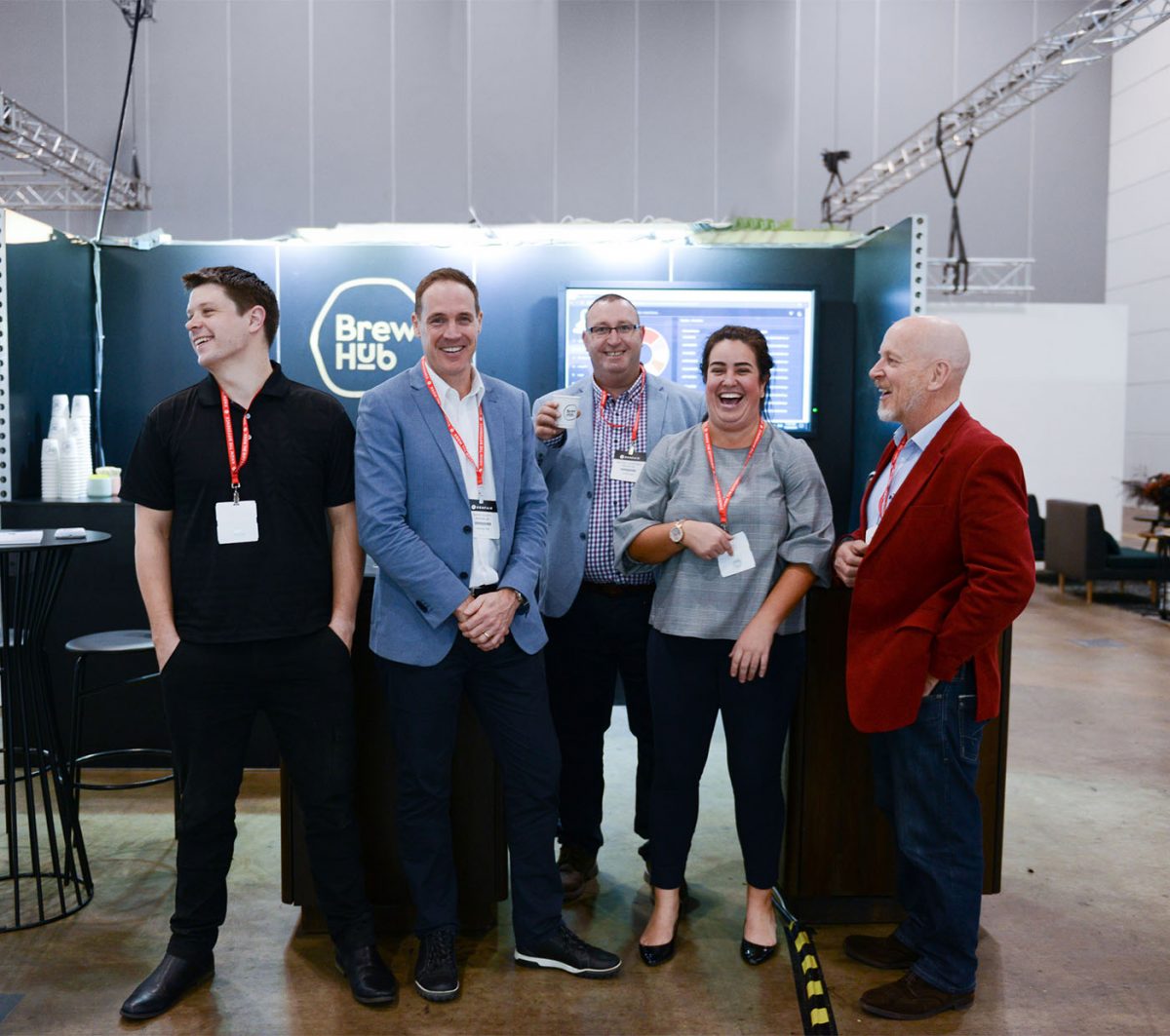 BrewHub team photo after a successful conference showcasing our Coffee Machines and services.
